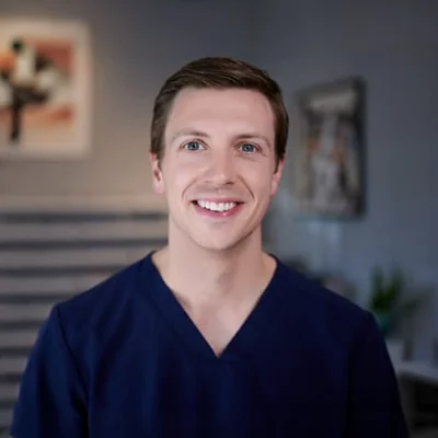 A headshot photo of Dr. Garrett Moen