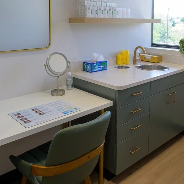 A contact lens station with sink and clean environment
